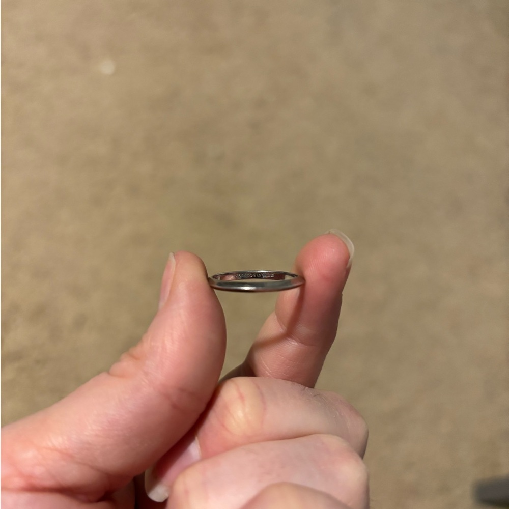 Size 7 platinum wedding band from Tiffany and Co.